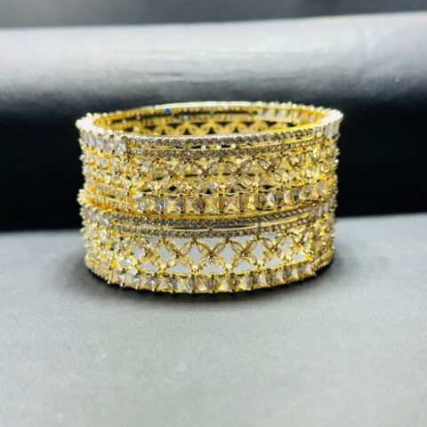 Exquisite Gold-Plated Floral Cut-Work Bangles with American Diamond & Baguette Stone Studding – Set of 2 (Kangan Style)