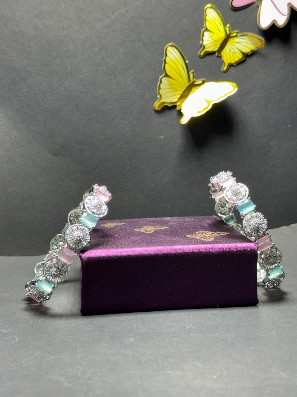 Radiant Medallion Statement Bangles – Dual-Tone Pastel & White Zirconia Kadas in Polished Silver Finish (Set of 2) - Image 2