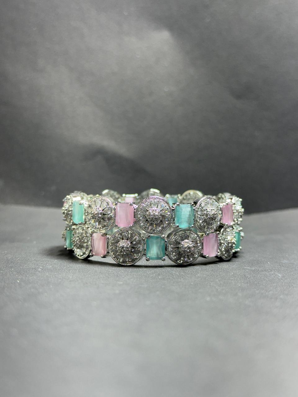 Radiant Medallion Statement Bangles – Dual-Tone Pastel & White Zirconia Kadas in Polished Silver Finish (Set of 2)