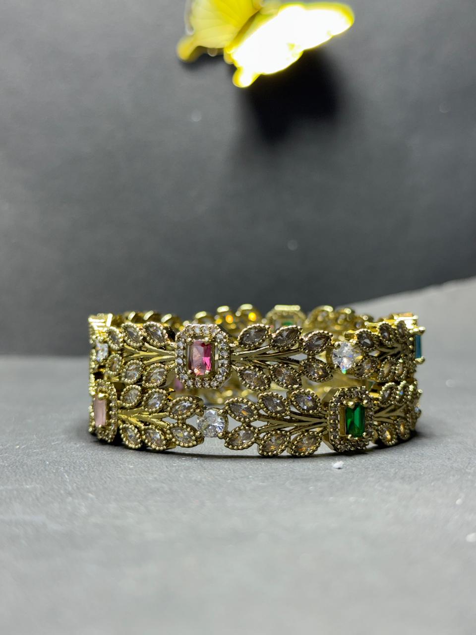 Regal Gold-Plated Leaf Motif Bangles – Multi-Color Baguette Gemstones with Shimmering Marquise Crystal Leaves (Set of 2)