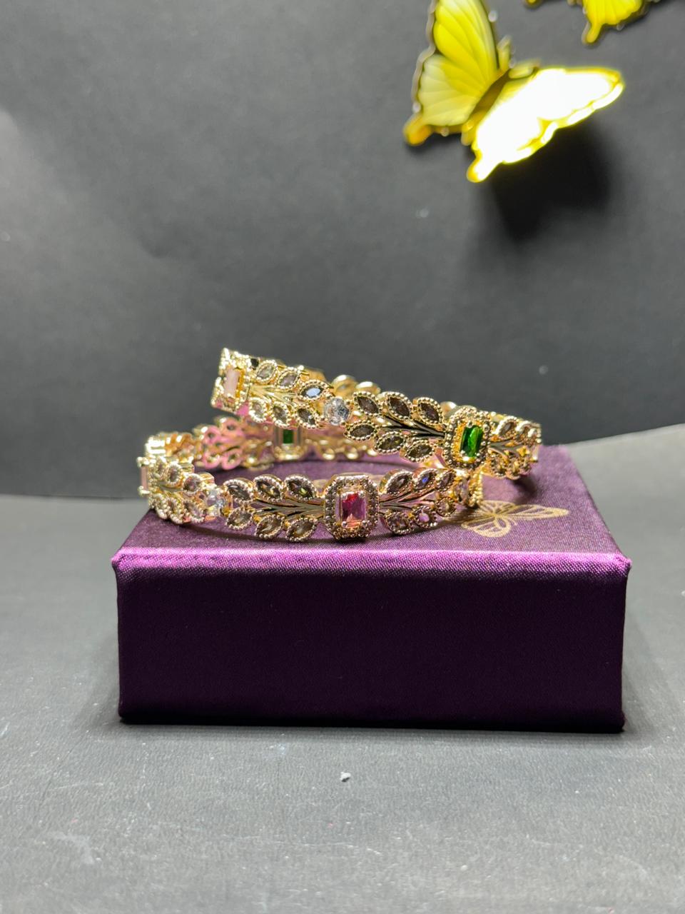 Exquisite Gold-Plated Leaf Motif Bangles with Multi-Color Baguette Gemstones and Marquise Crystals (Set of 2) - Image 2