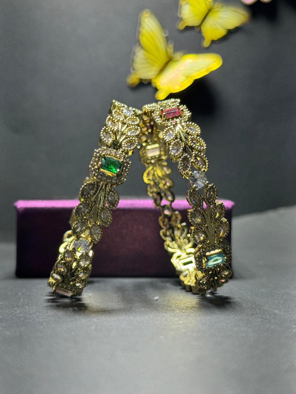 Regal Gold-Plated Leaf Motif Bangles – Multi-Color Baguette Gemstones with Shimmering Marquise Crystal Leaves (Set of 2) - Image 6