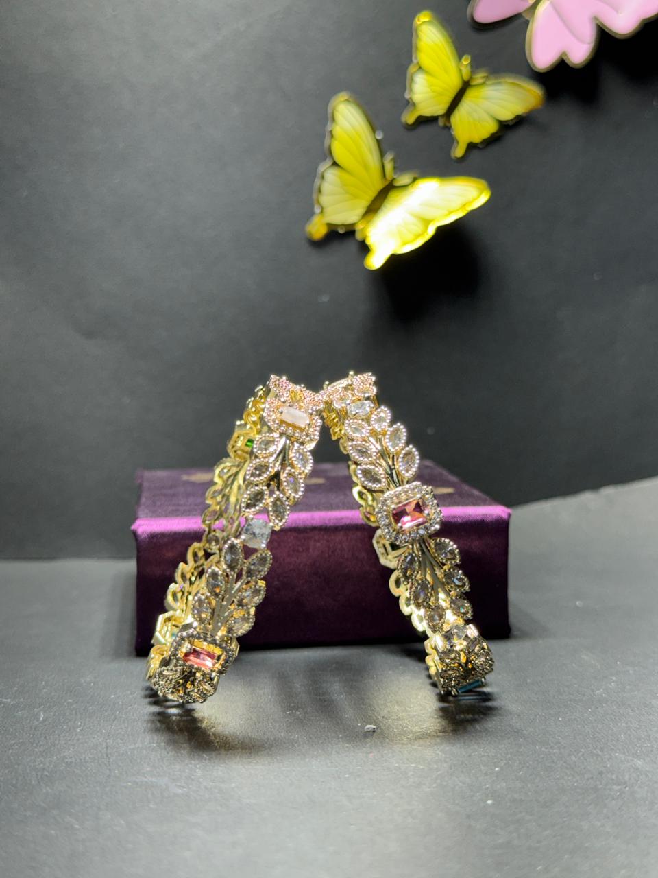Exquisite Gold-Plated Leaf Motif Bangles with Multi-Color Baguette Gemstones and Marquise Crystals (Set of 2) - Image 3